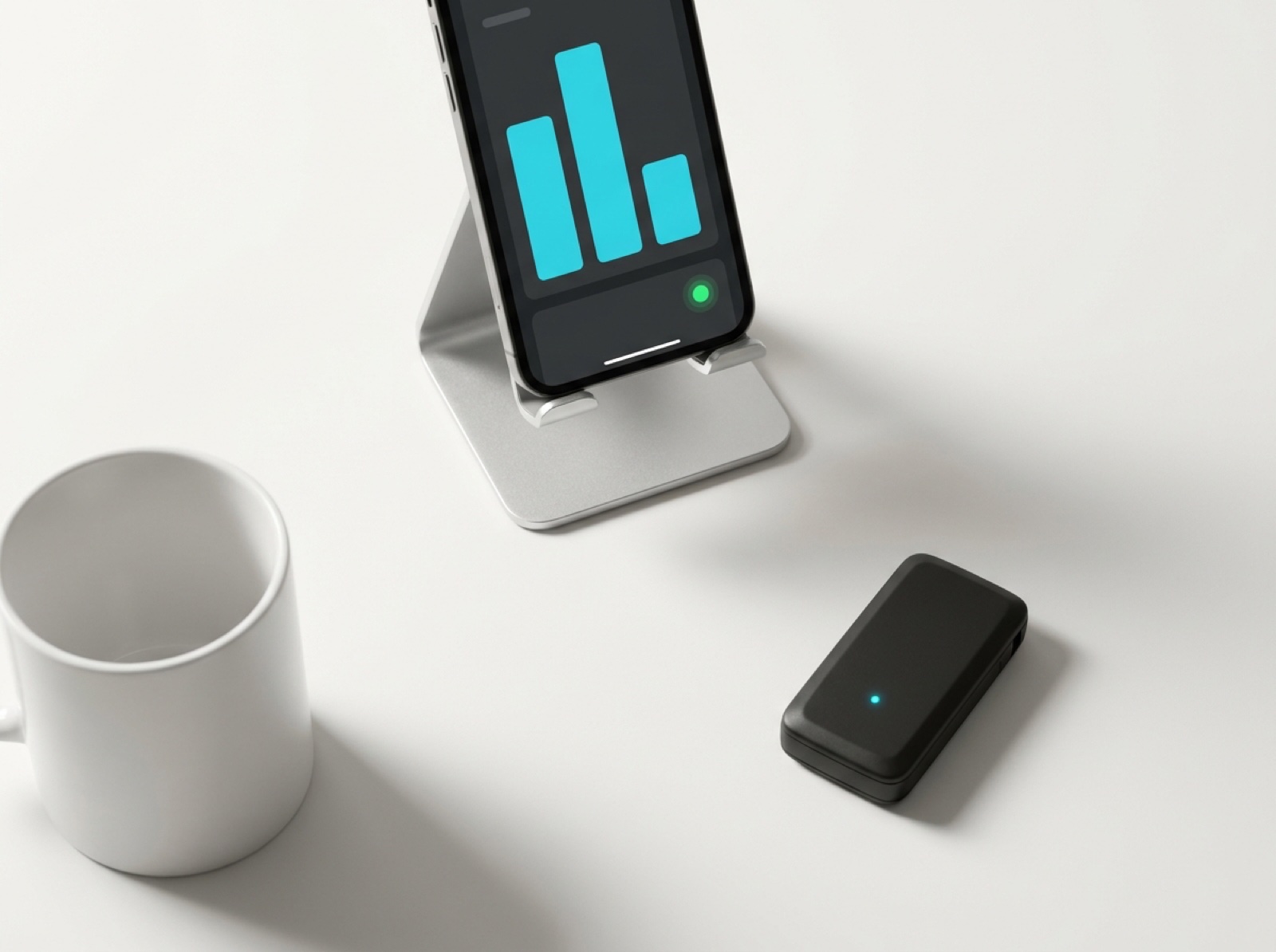 iPhone with KPI dashboard, truck key fob and coffee mug on off-white